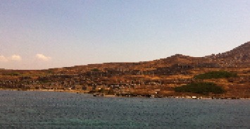 Sailing away from Delos, Greece, the ancient religious center of Greek mythology
